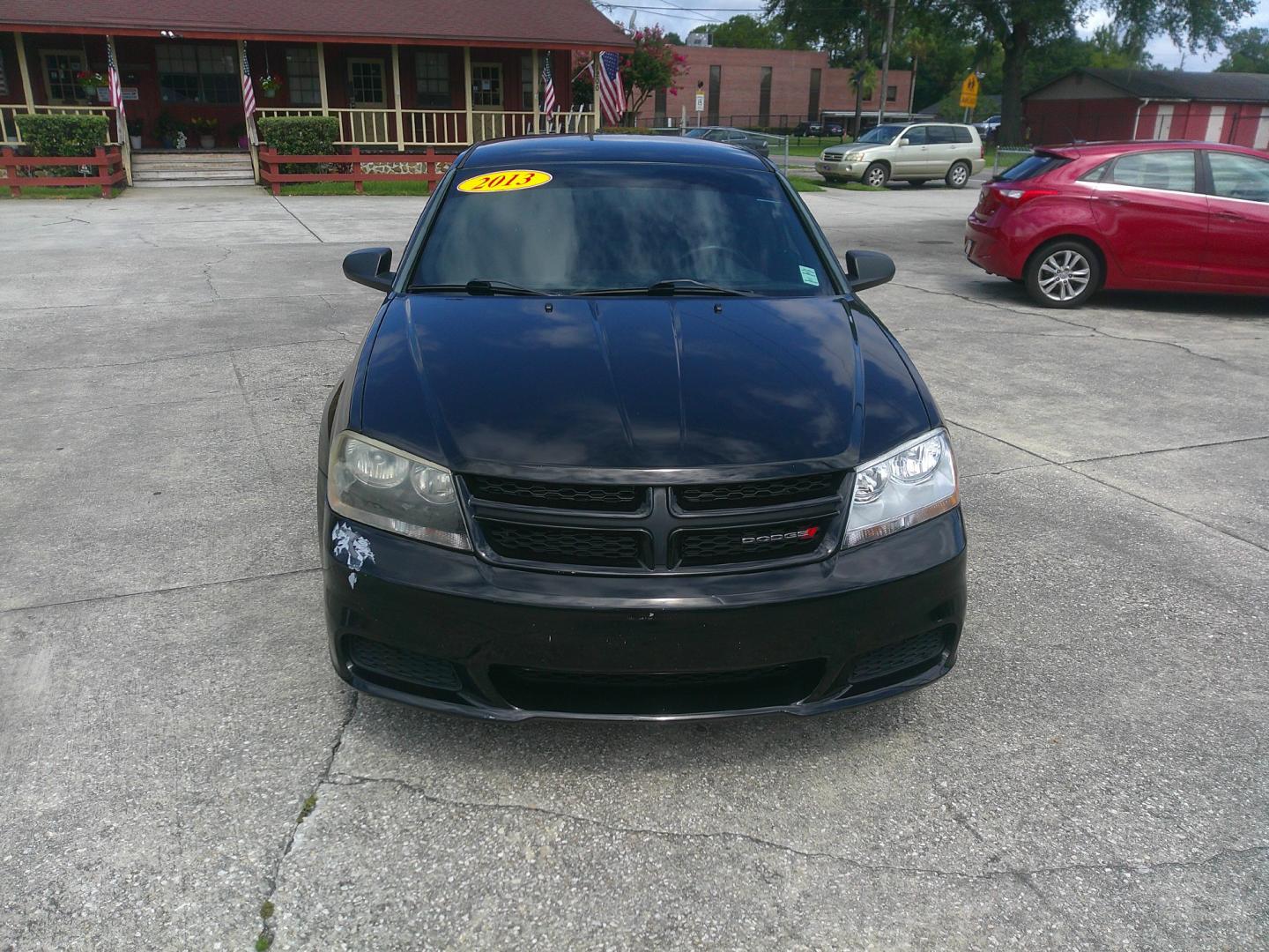 2013 BLACK DODGE AVENGER SE (1C3CDZAG5DN) , located at 1200 Cassat Avenue, Jacksonville, FL, 32205, (904) 695-1885, 30.302404, -81.731033 - Photo#0